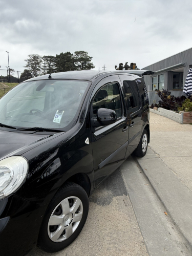 9897_passenger_side_image_of_the_2013_renault_wheelchair_vehicle