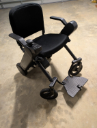 Whill Foldable Power Travel Chair